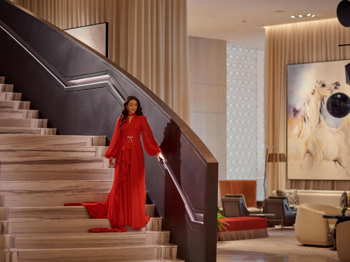 Grand Hyatt Kuwait Hotel Kuwait City Exterior foto A model in a red dress